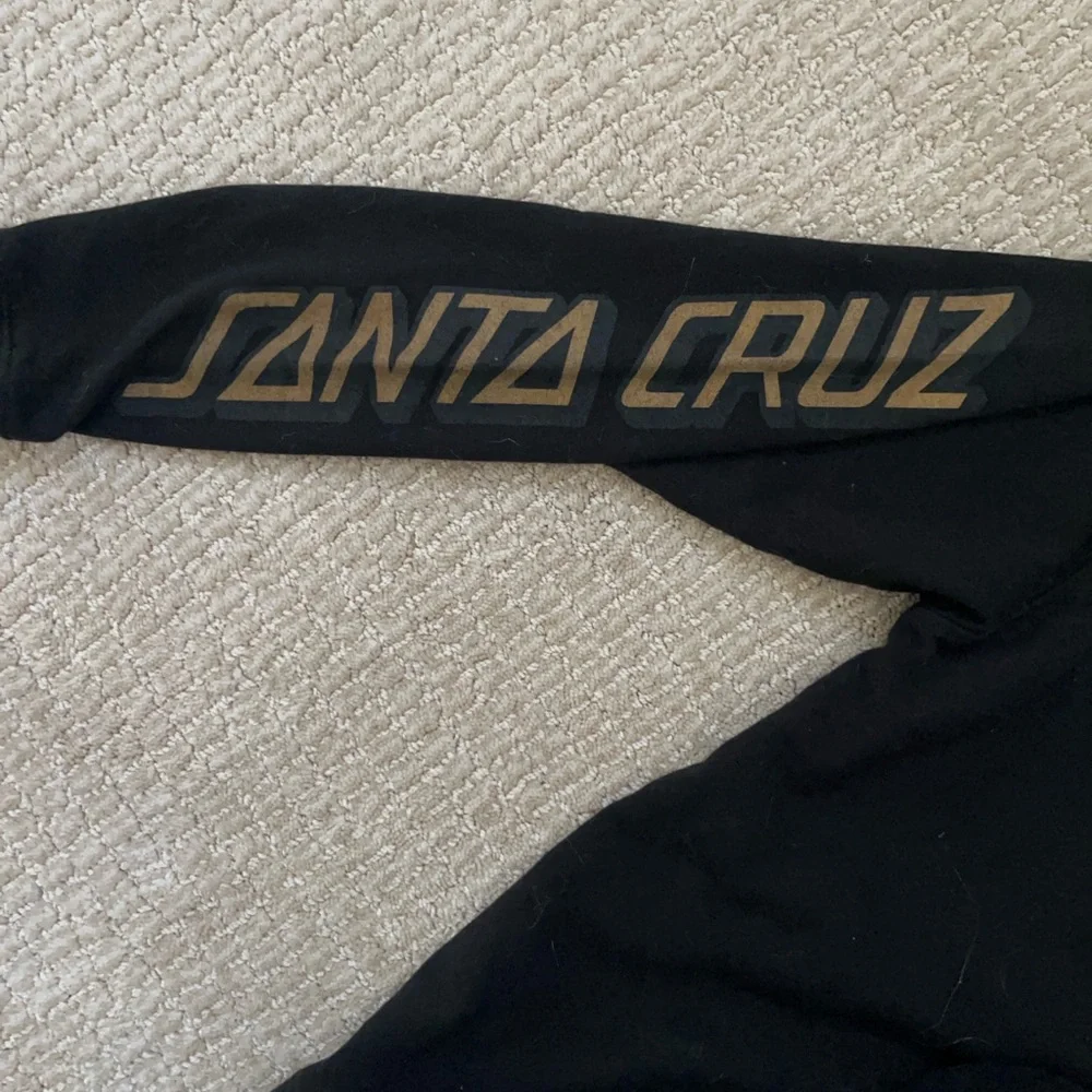 Santa Cruz Skateboards Black Hoodie with Gold and Red Accents - Picture 4 of 5